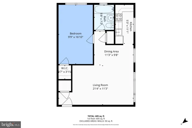 a picture of a bench in front of a wall