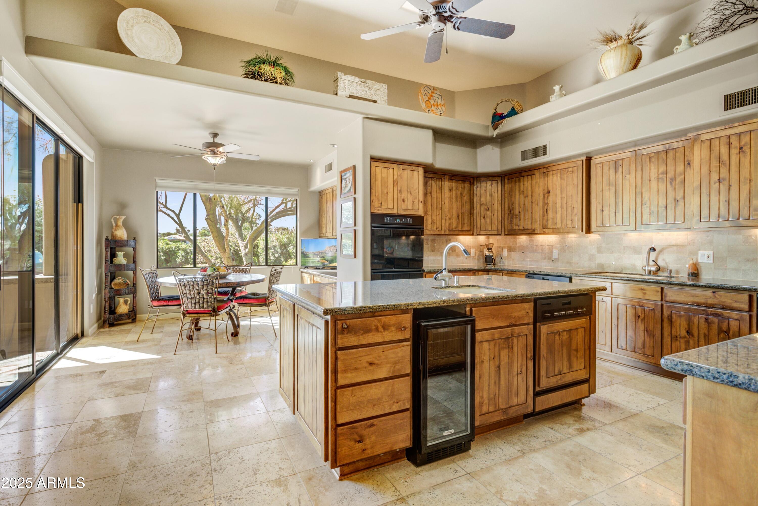 18525 East Picacho Road Rio Verde, AZ 85263 - Photo 12 of 31 012_Kitchen To Casual Dining