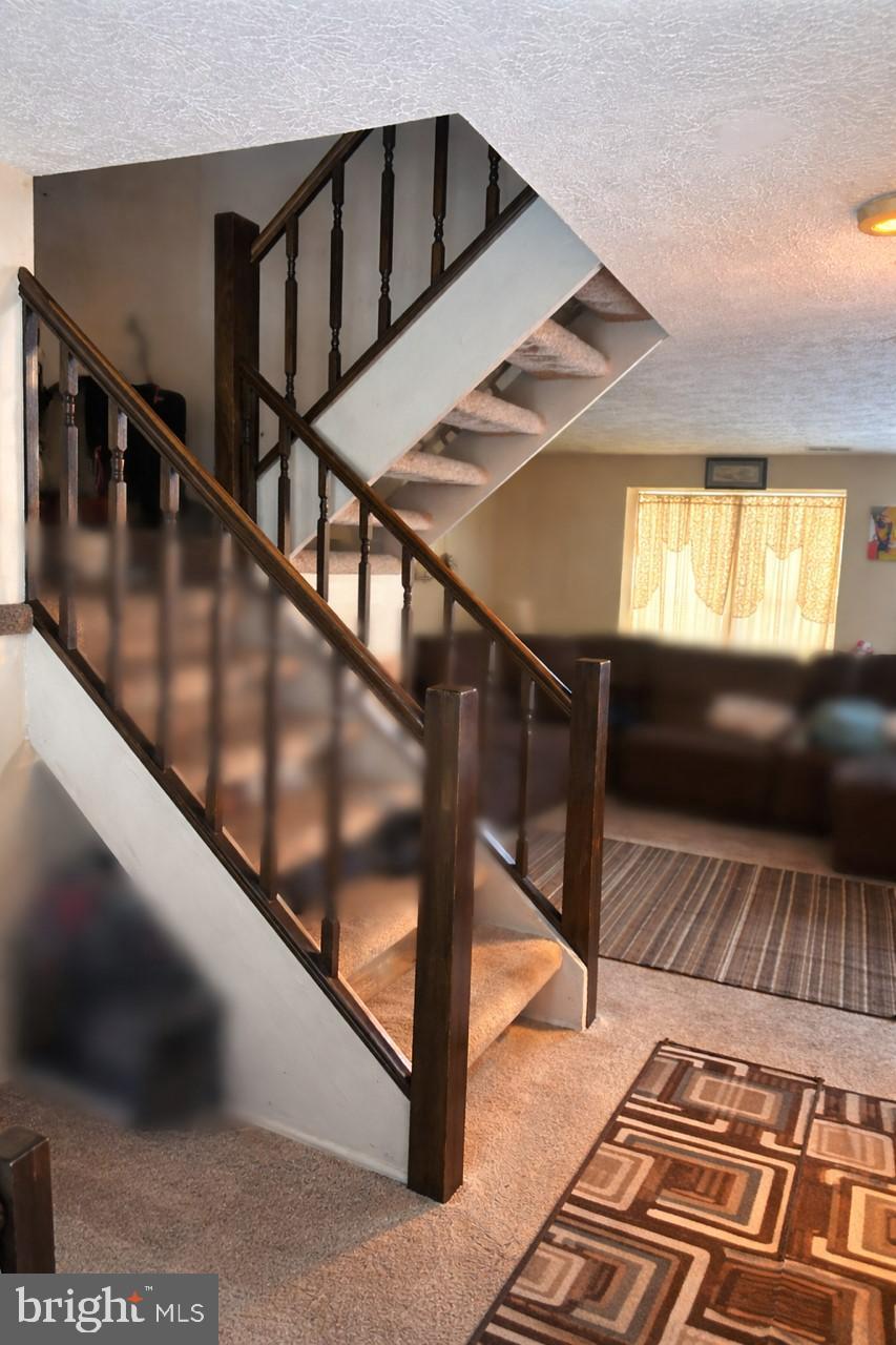 545 Beebe Court Frederick, MD 21703 - Photo 3 of 13 Living Room-Tenants personal items are blurred