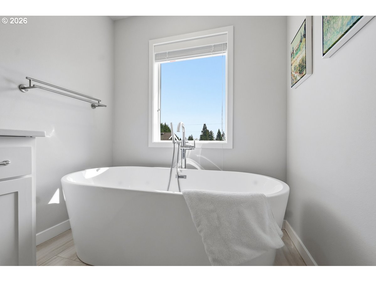 16275 Southwest Jade View Way Beaverton, OR 97007 - Photo 19 of 34 a bathroom with a sink and a mirror