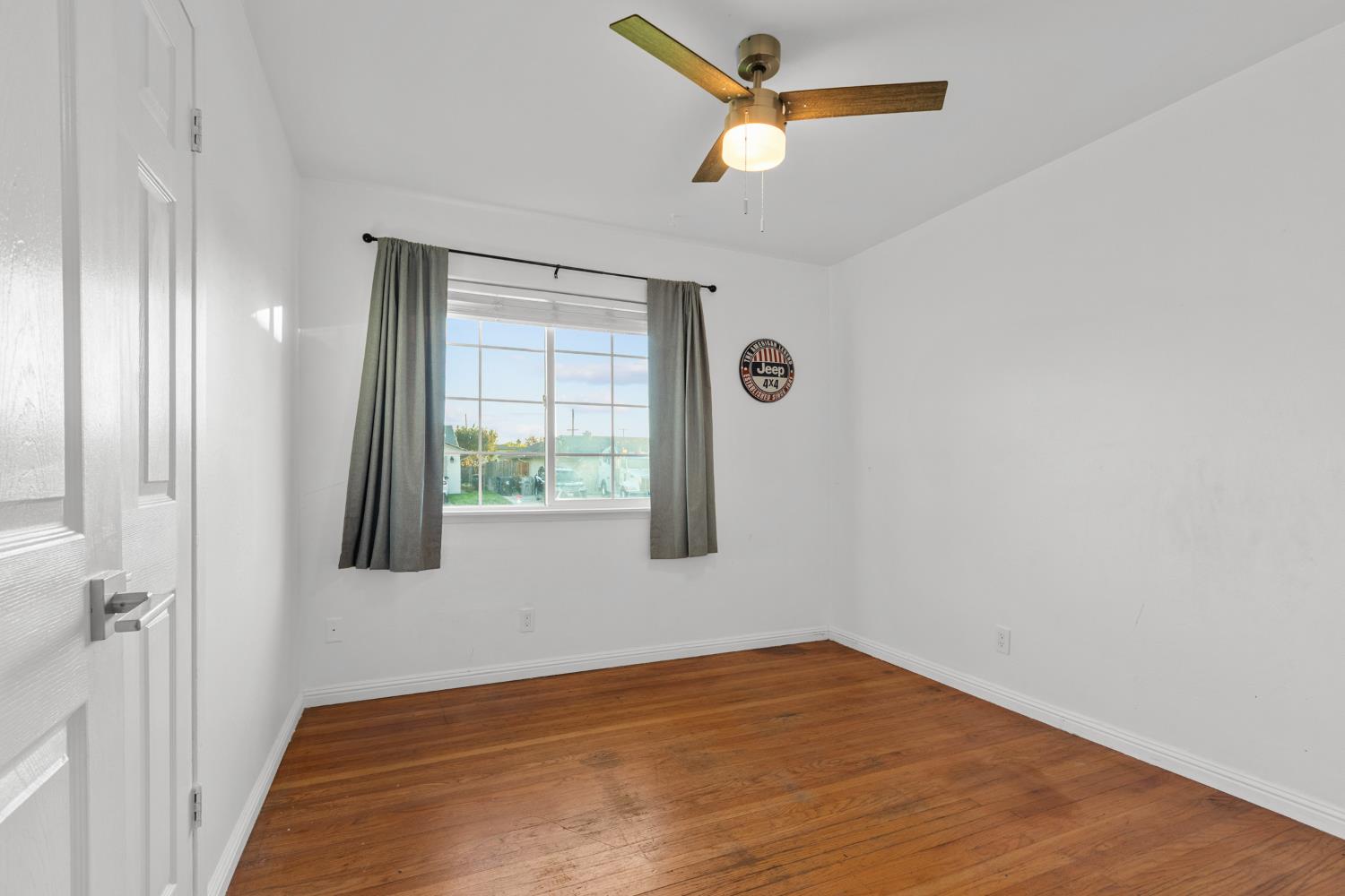 2121 Aaron Way Sacramento, CA 95822 - Photo 14 of 47 a view of an empty room with a window