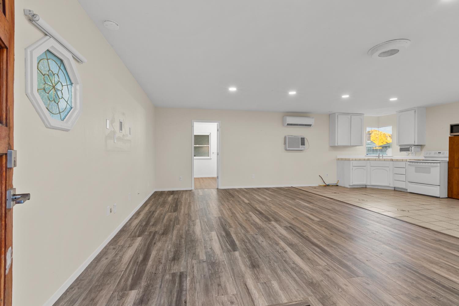 2121 Aaron Way Sacramento, CA 95822 - Photo 25 of 47 wooden floor in an empty room with a window