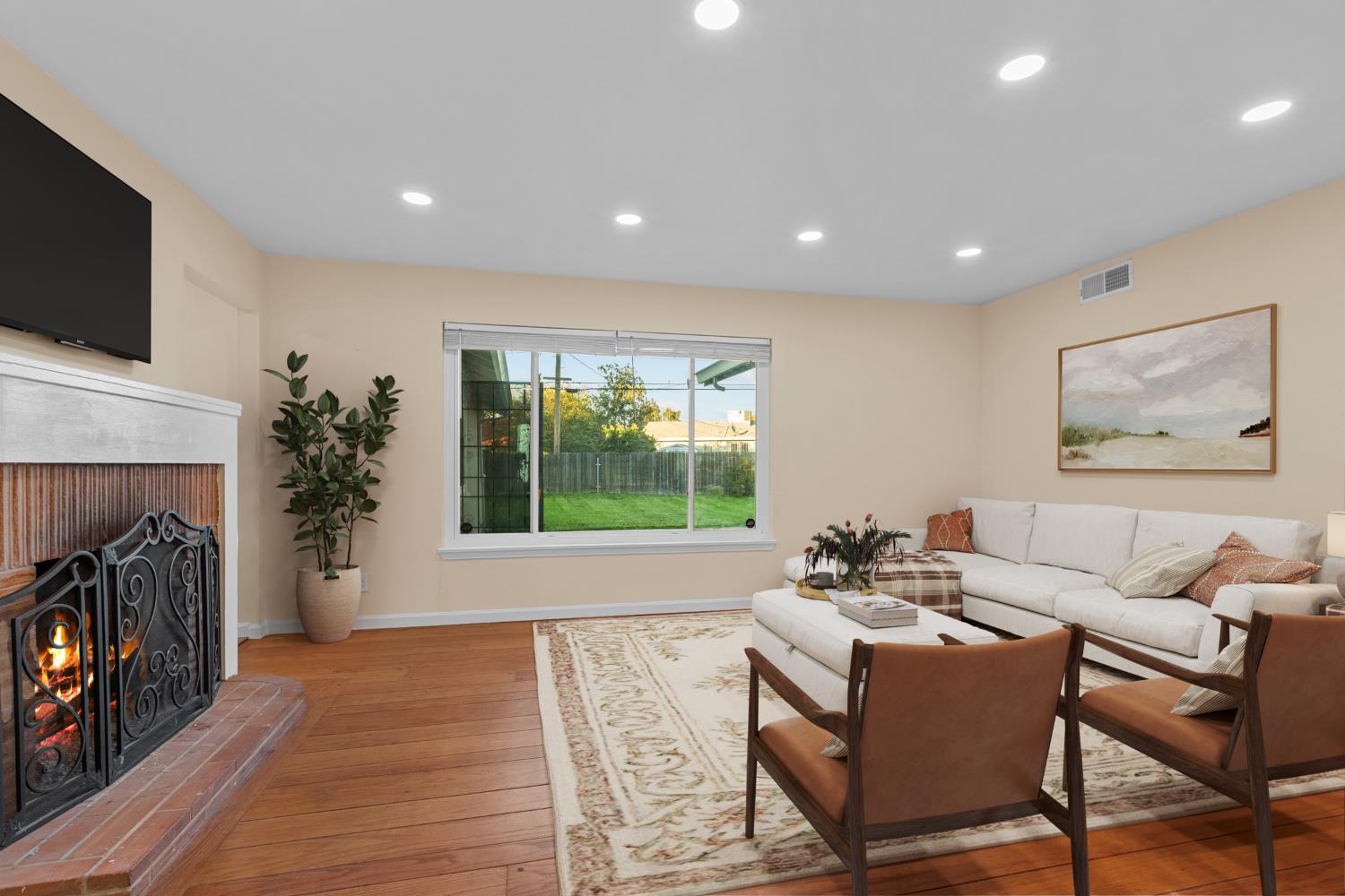 2121 Aaron Way Sacramento, CA 95822 - Photo 4 of 47 a living room with furniture and a fireplace