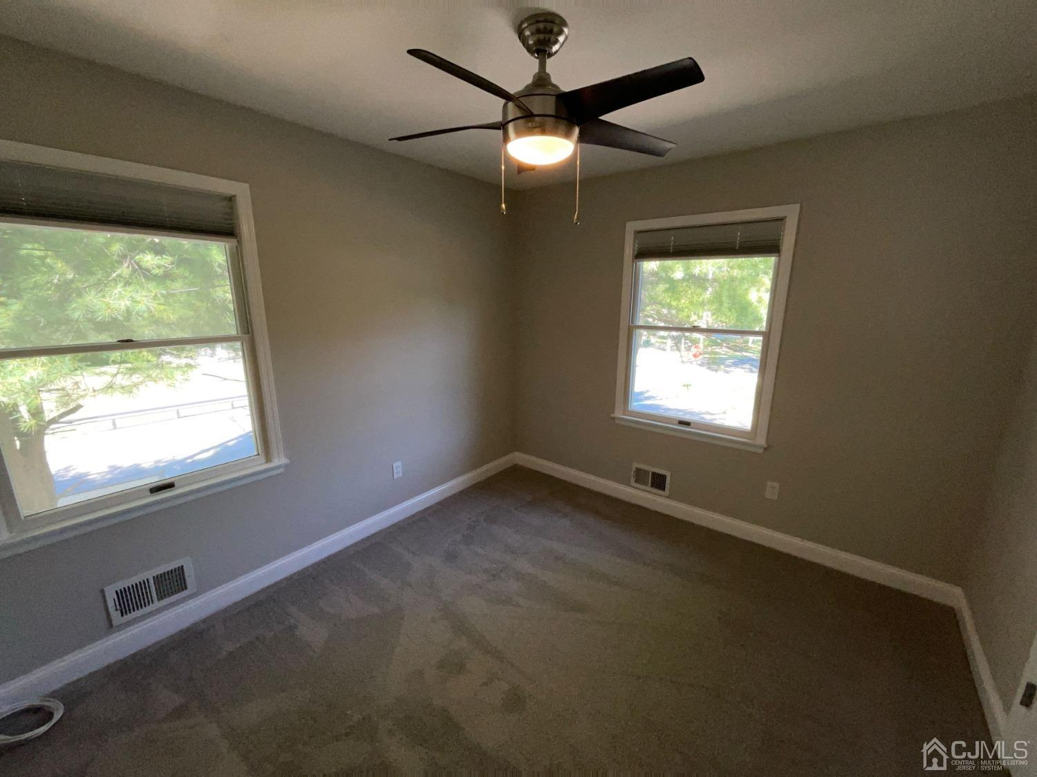 6 Ericson Avenue Helmetta, NJ 08828 - Photo 11 of 15 a view of an empty room with a window