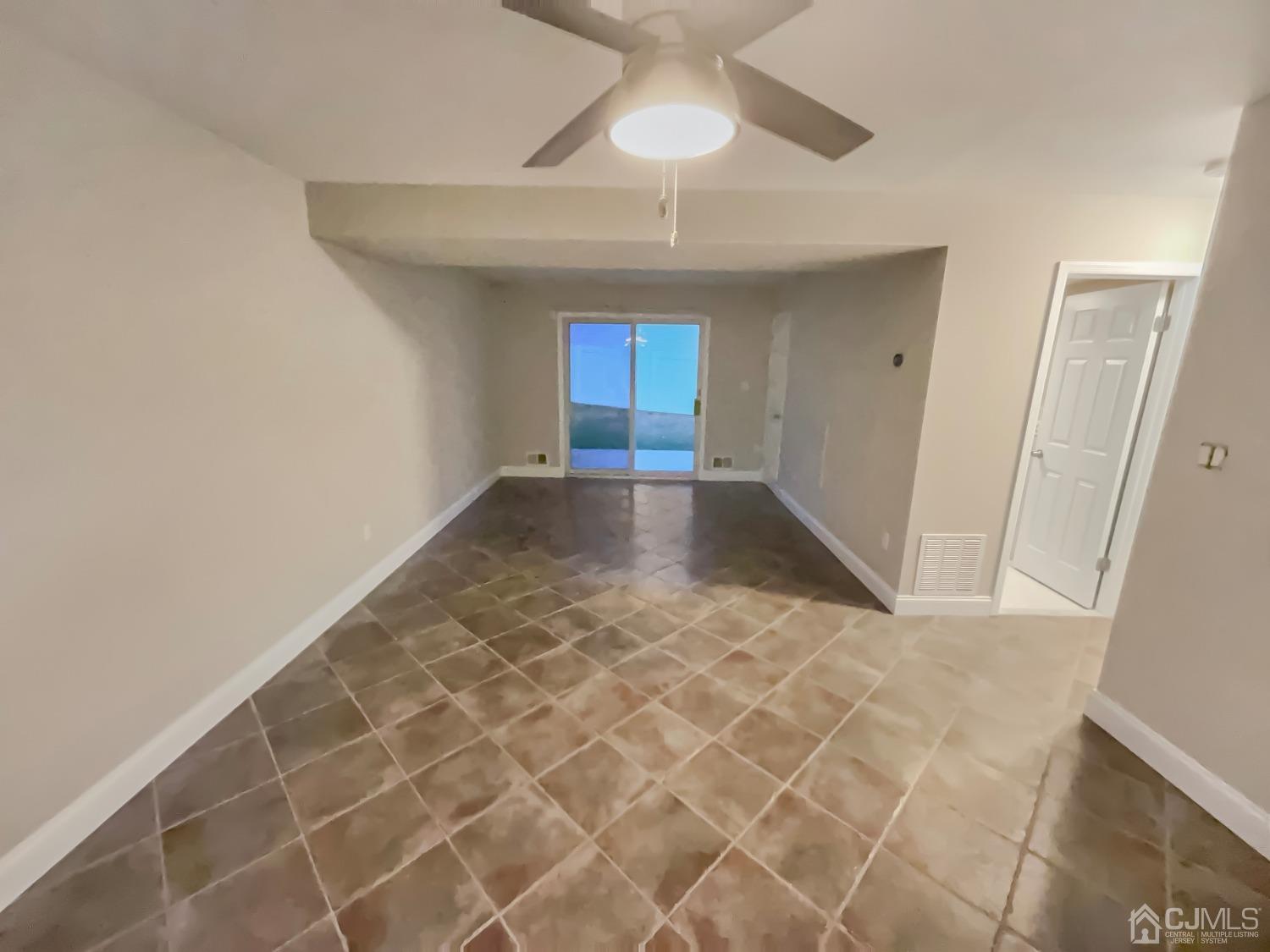 6 Ericson Avenue Helmetta, NJ 08828 - Photo 14 of 15 an empty room with a natural light