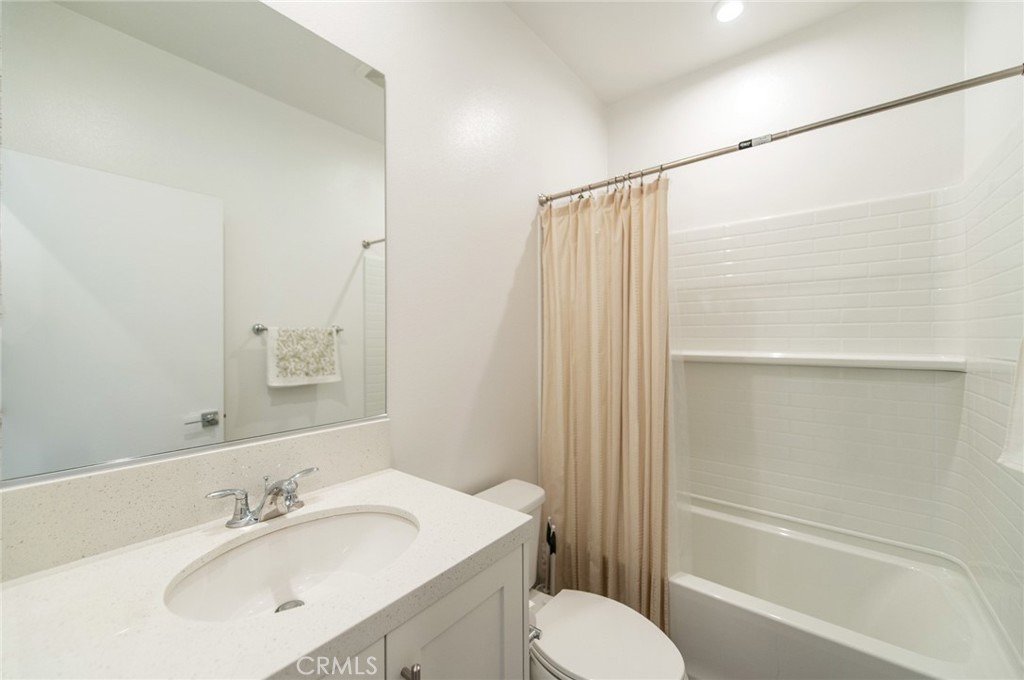 1515 West Bushell Street Anaheim, CA 92805 - Photo 14 of 22 a bathroom with a sink toilet and shower