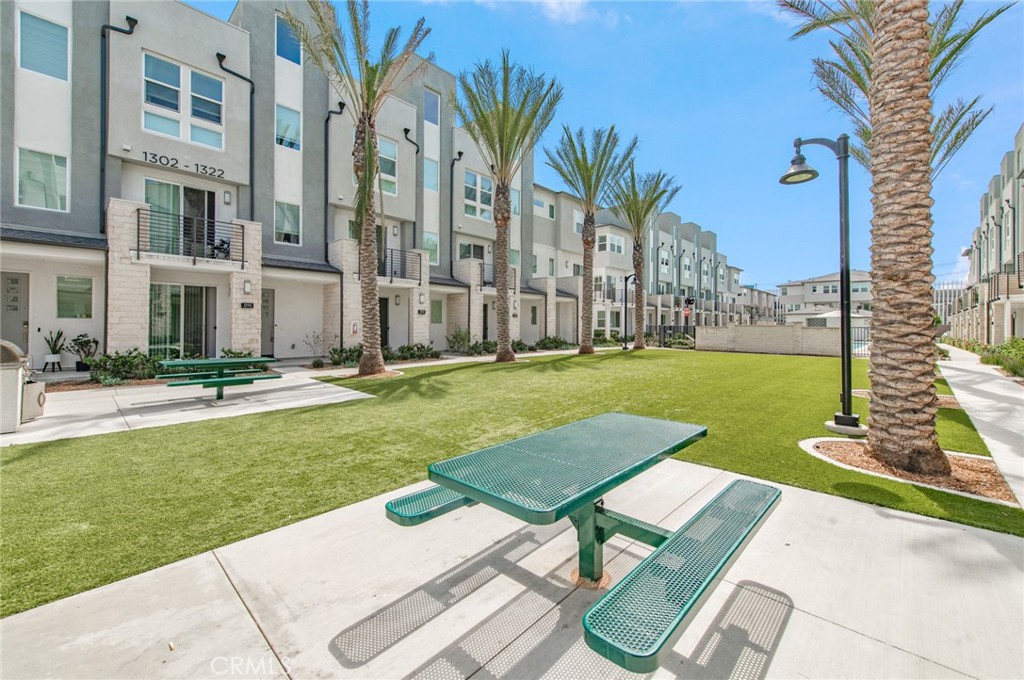 1515 West Bushell Street Anaheim, CA 92805 - Photo 18 of 22 a view of a backyard with plants and outdoor seating