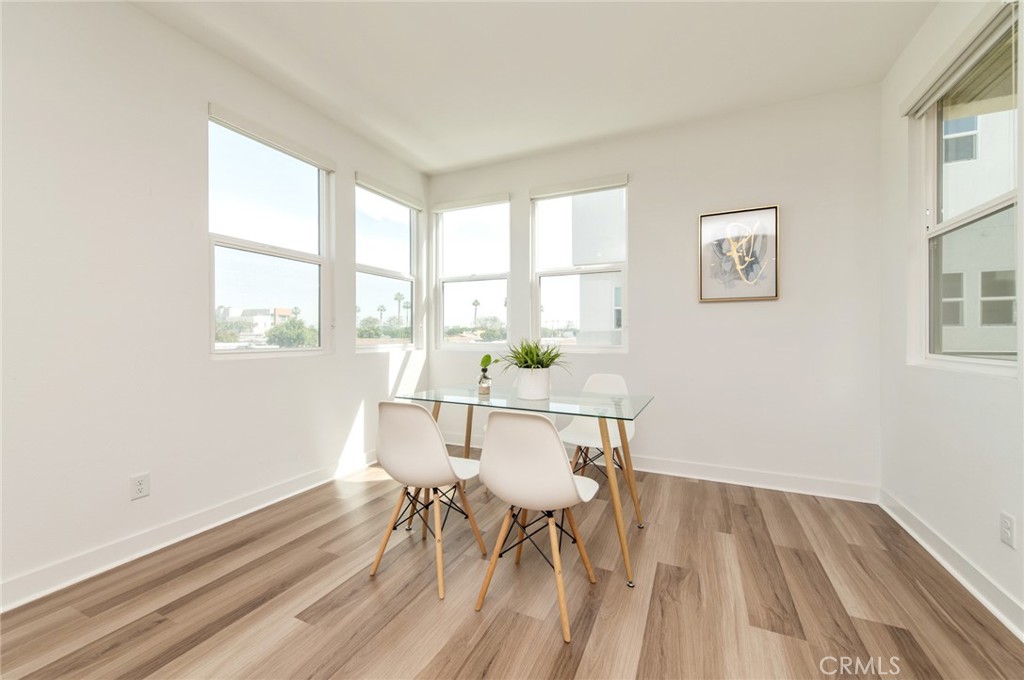 1515 West Bushell Street Anaheim, CA 92805 - Photo 8 of 22 a view of a dining room with furniture window and outside view