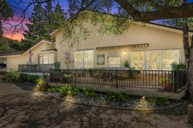 a view of a porch with a yard