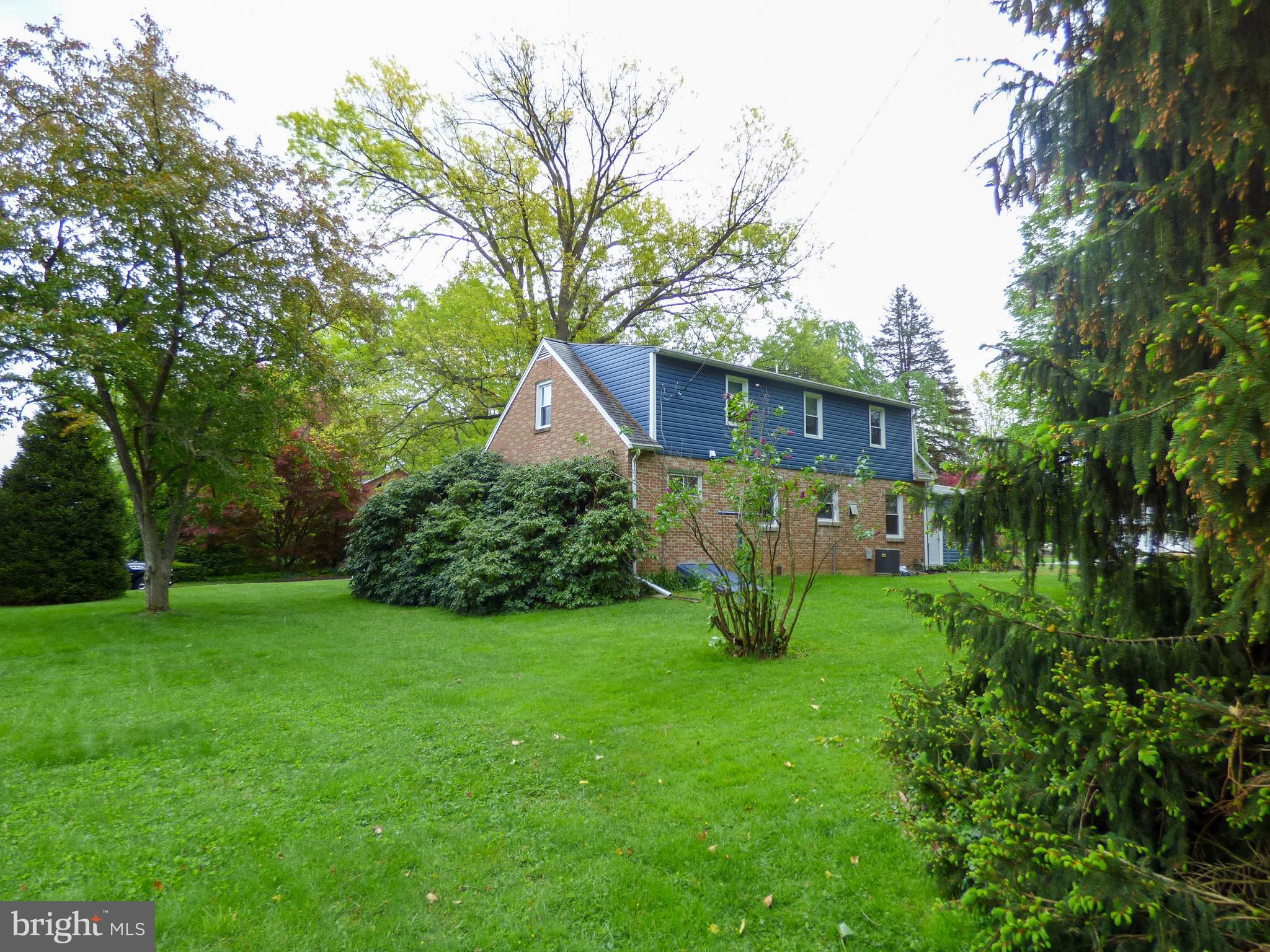 2390 Grandview Road York, PA 17403 - Photo 3 of 41 a view of a house with backyard and garden
