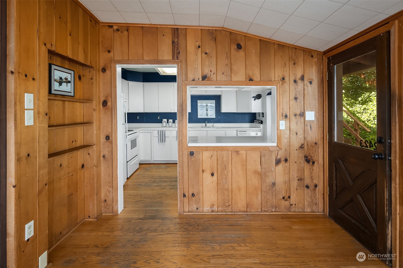 2423 Southwest 172nd Street Burien, WA 98166 - Photo 15 of 26 a kitchen with stainless steel appliances granite countertop a refrigerator and a stove top oven