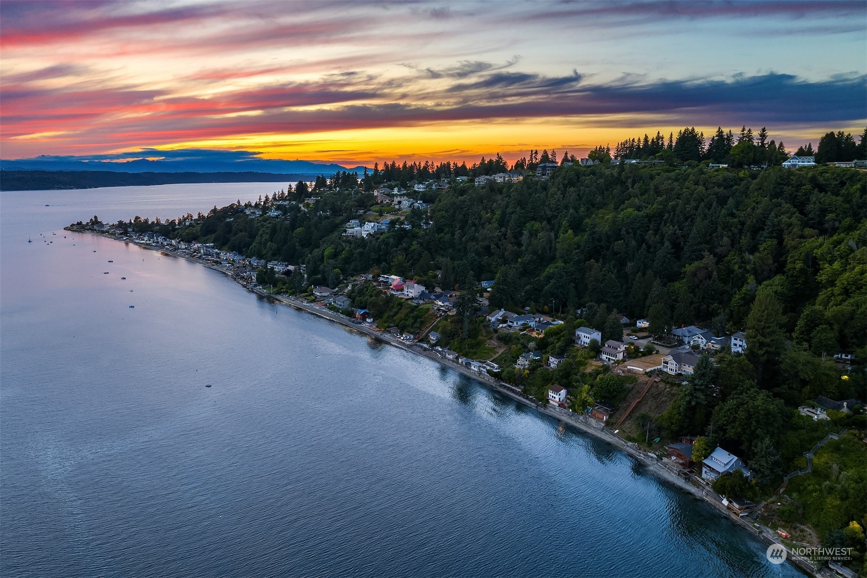 2423 Southwest 172nd Street Burien, WA 98166 - Photo 2 of 26 a view of a lake from a yard