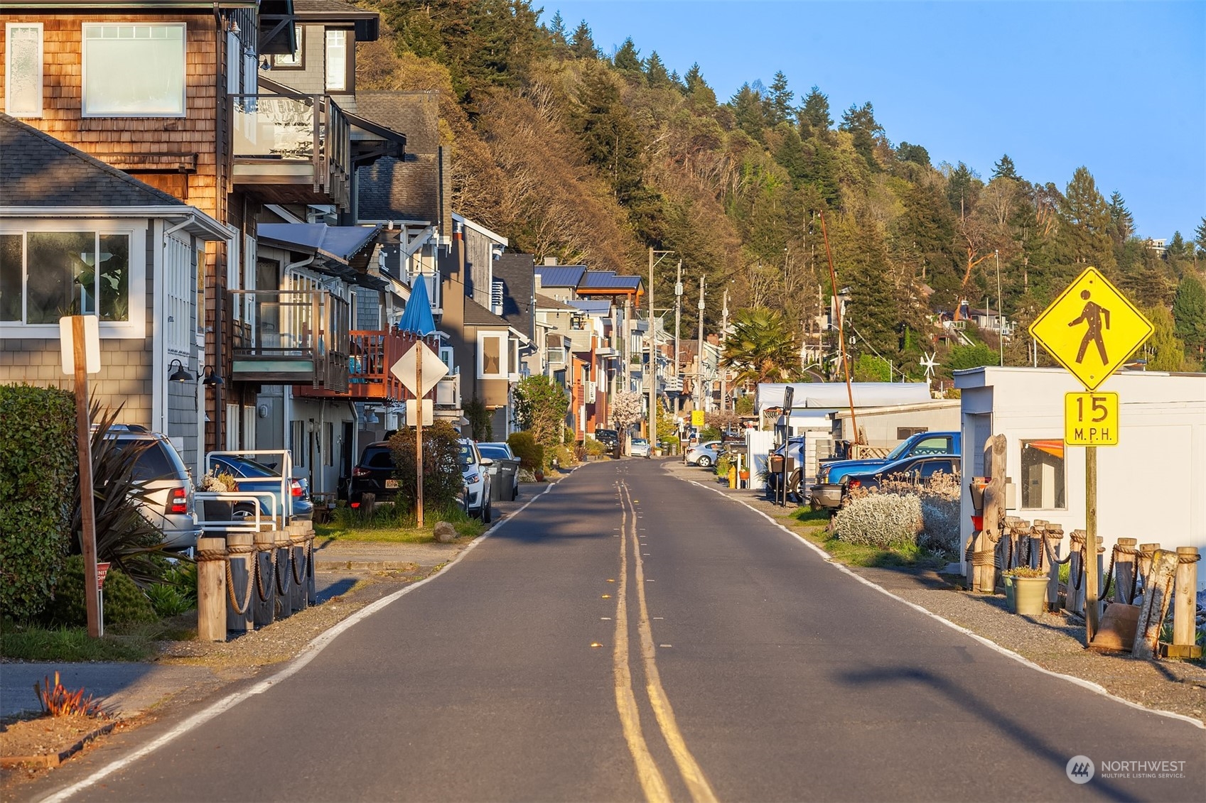 2423 Southwest 172nd Street Burien, WA 98166 - Photo 22 of 26 a city street lined with tall buildings