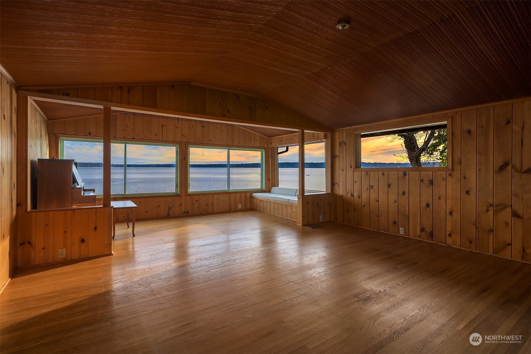 2423 Southwest 172nd Street Burien, WA 98166 - Photo 6 of 26 an empty room with wooden floor and windows