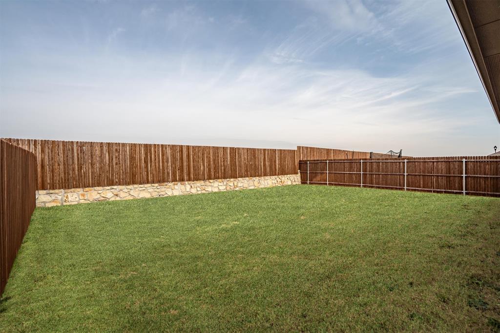 1864 Mensa Drive Haslet, TX 76052 - Photo 33 of 40 a view of a backyard