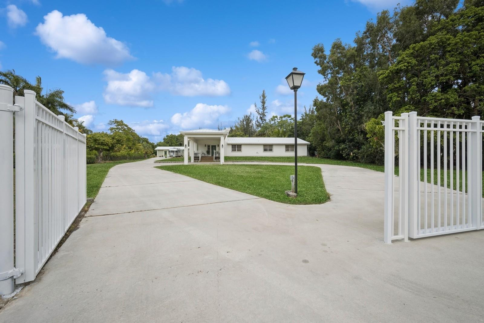 6500 Southwest 185th Way Southwest Ranches, FL 33331 - Photo 6 of 46 a view of a house with a park