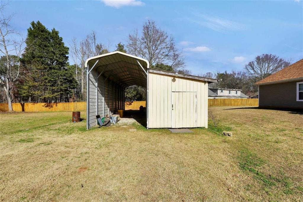 130 Deep Step Road Covington, GA 30014 - Photo 12 of 35 a view of a outdoor space with a house