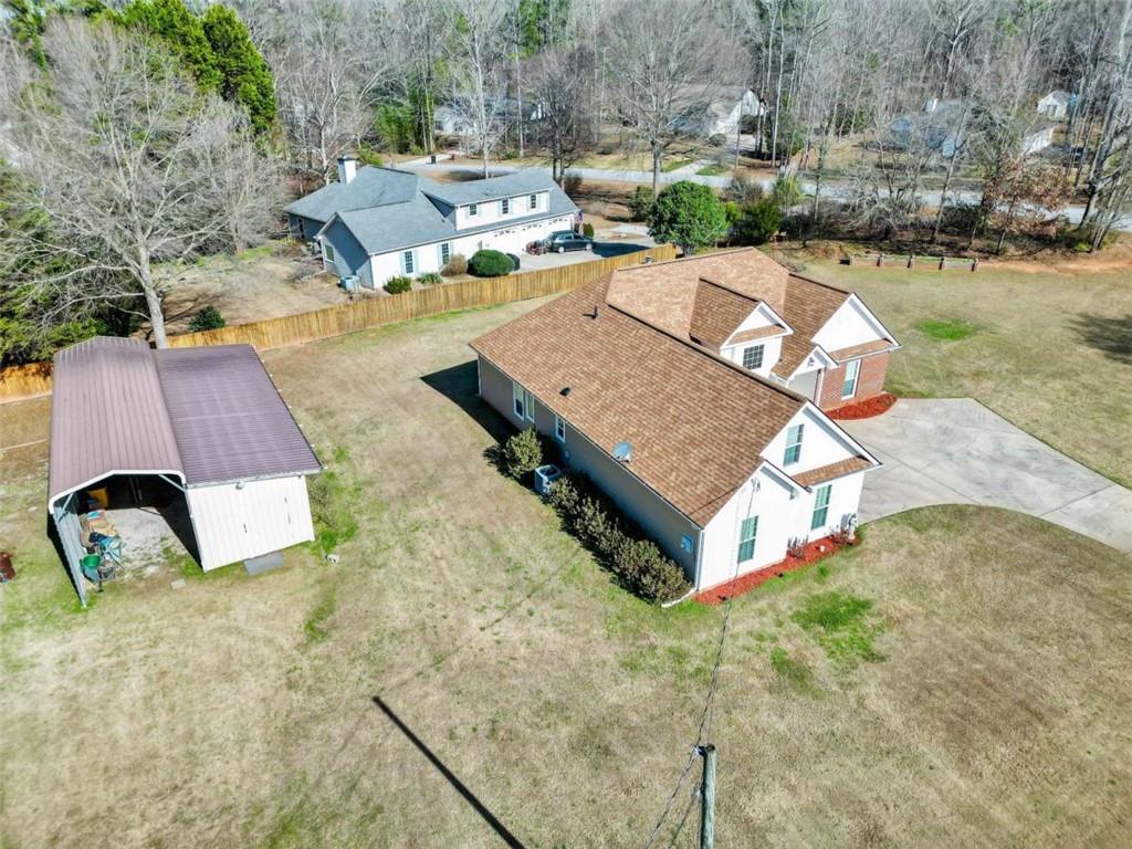 130 Deep Step Road Covington, GA 30014 - Photo 15 of 35 an aerial view of a house with garden space and street view