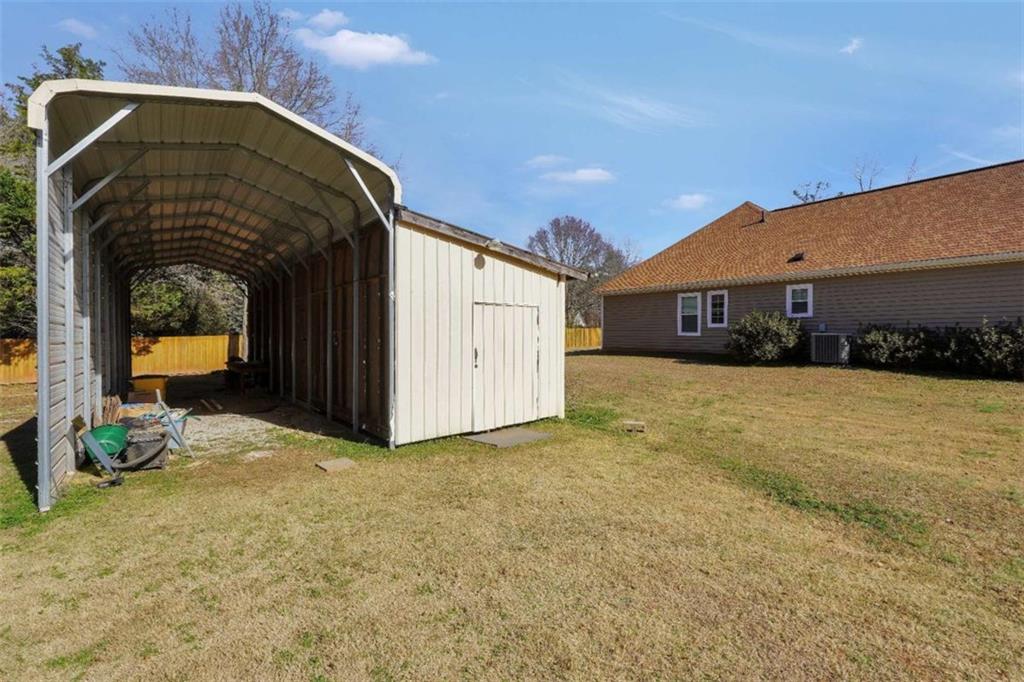130 Deep Step Road Covington, GA 30014 - Photo 10 of 35 a view of a house with a yard