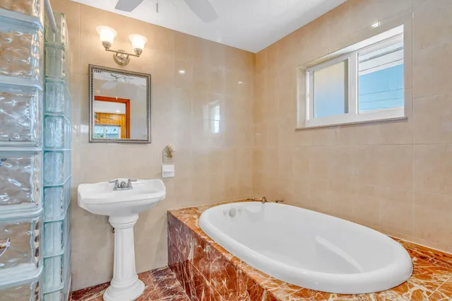 a view of a livingroom with furniture window and outside view