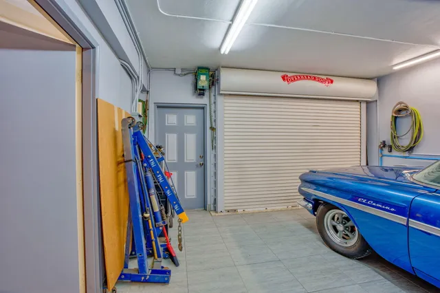 a en suite bathroom with a sink and mirror