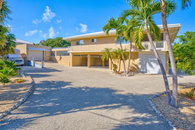 a view of a house with a street
