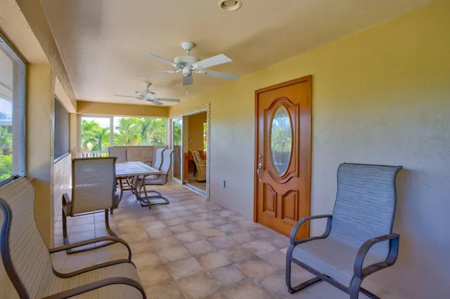 a outdoor space with patio furniture and a fireplace