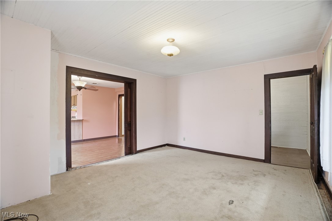 8045 Veto Road Belpre, OH 45714 - Photo 27 of 50 Spare room featuring light colored carpet and a ceiling fan