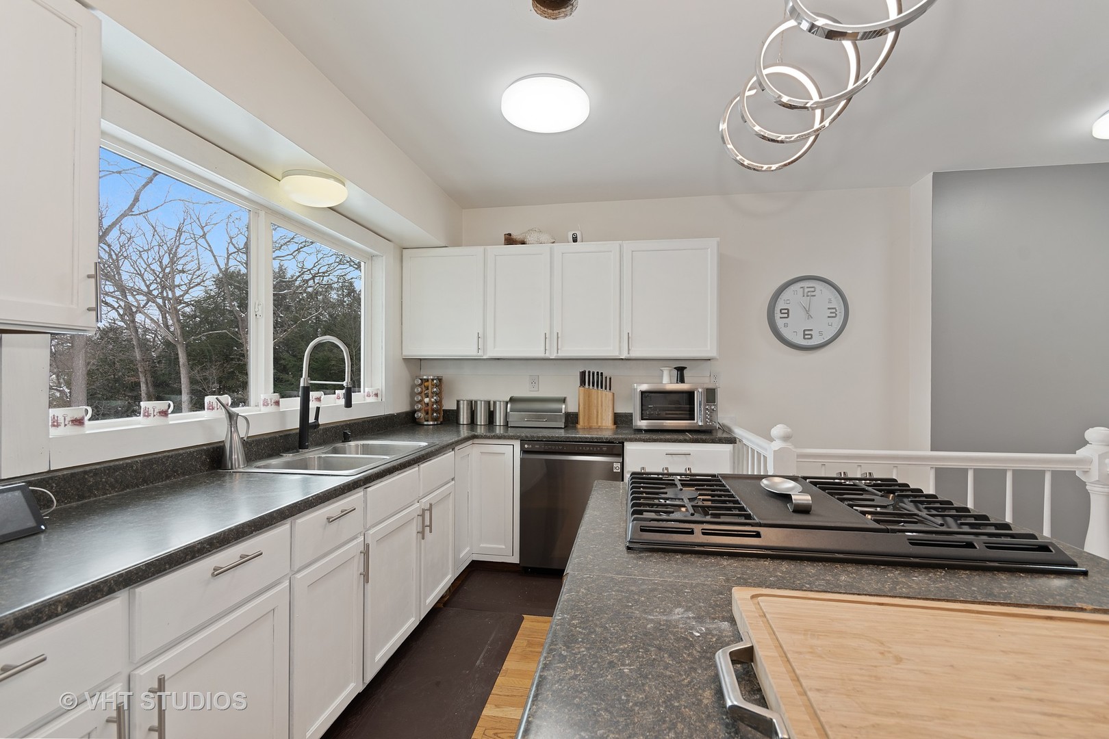 40W938 Whitney Road St. Charles, IL 60175 - Photo 5 of 20 a kitchen with a stove and a sink