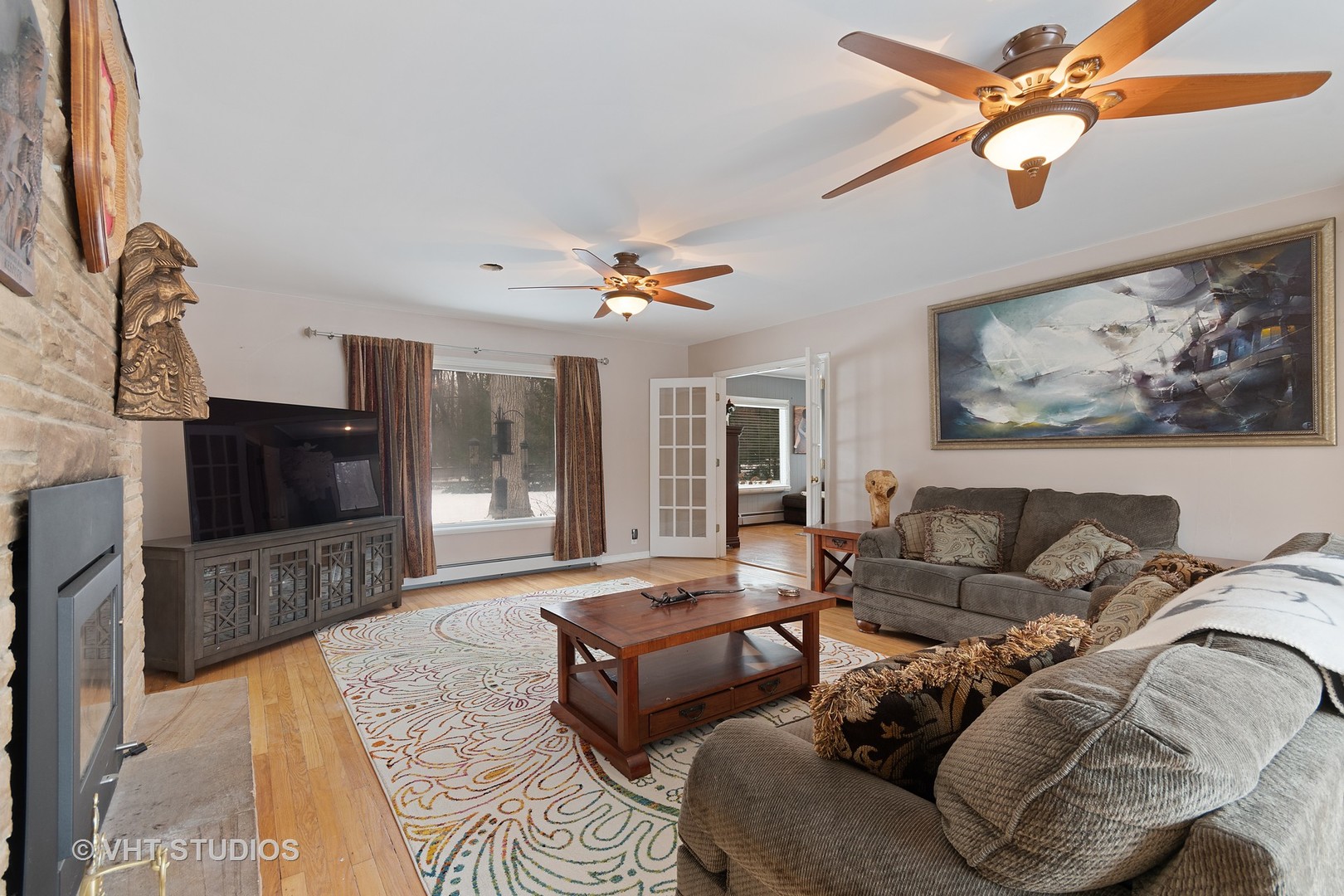 40W938 Whitney Road St. Charles, IL 60175 - Photo 9 of 20 a living room with furniture and a flat screen tv