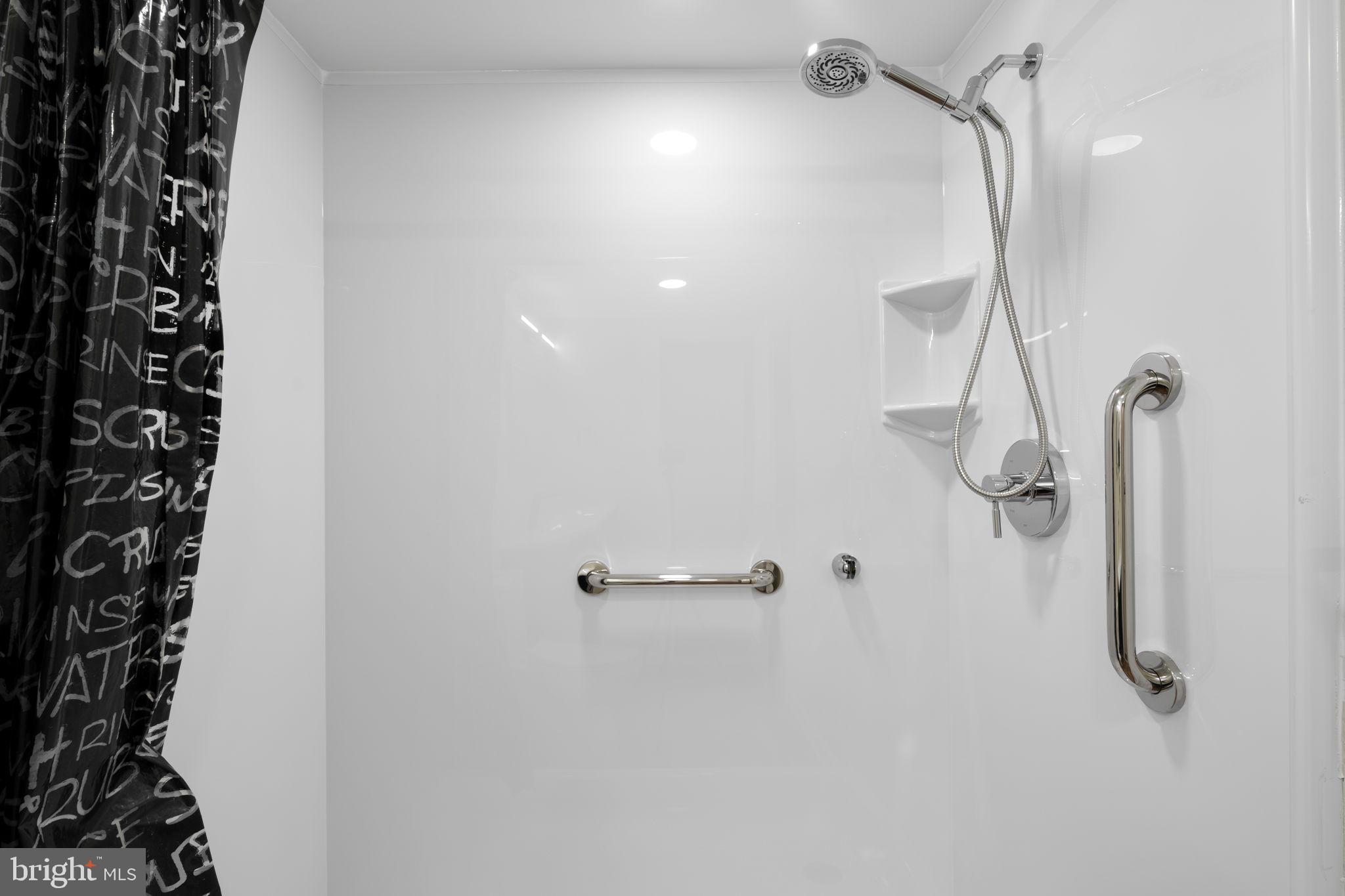 10053 Windstream Drive, Unit 3 Columbia, MD 21044 - Photo 15 of 30 a bathroom with a shower