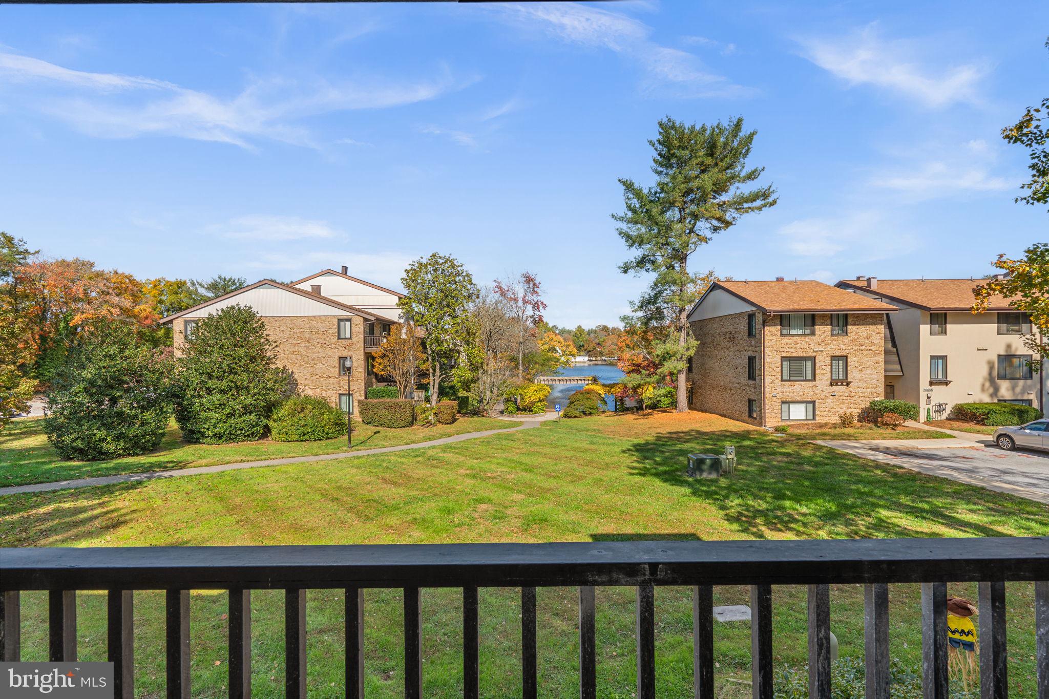 10053 Windstream Drive, Unit 3 Columbia, MD 21044 - Photo 28 of 30 a view of a swimming pool with a yard
