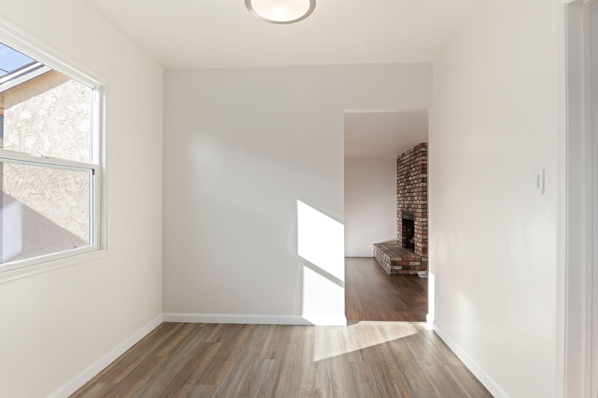 325 North J Street Oxnard, CA 93030 - Photo 11 of 25 a view of empty room with wooden floor