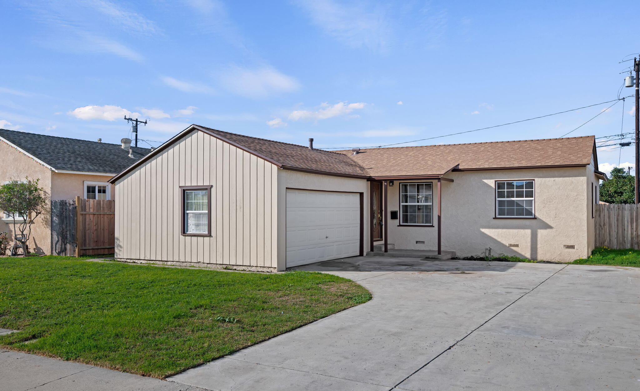 325 North J Street Oxnard, CA 93030 - Photo 2 of 25 a view of a house with a yard
