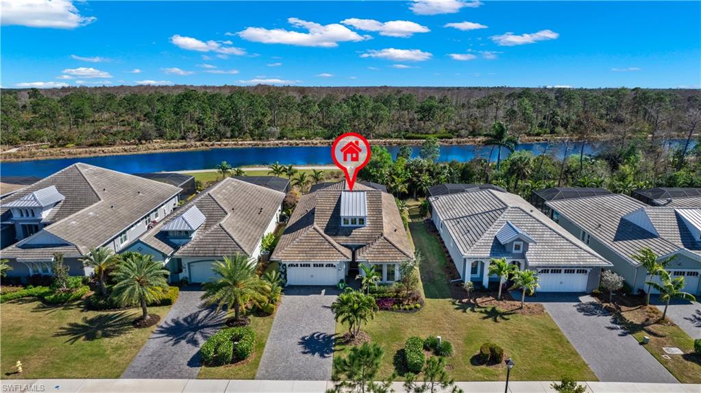 6359 Antigua Way Naples, FL 34113 - Photo 1 of 48 an aerial view of a house