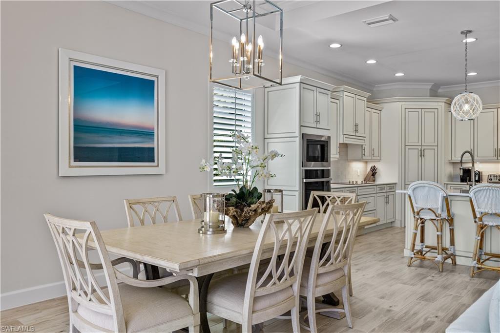 6359 Antigua Way Naples, FL 34113 - Photo 48 of 48 a view of a dining room with furniture