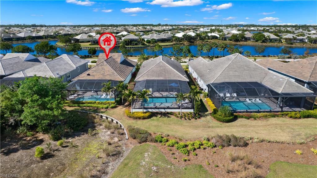 6359 Antigua Way Naples, FL 34113 - Photo 32 of 48 an aerial view of residential houses with outdoor space and swimming pool