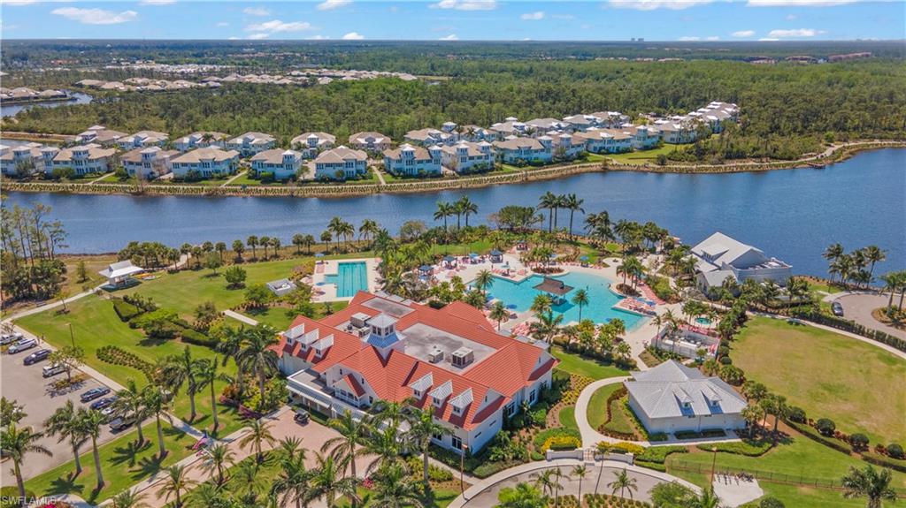 6359 Antigua Way Naples, FL 34113 - Photo 36 of 48 an aerial view of residential houses with outdoor space