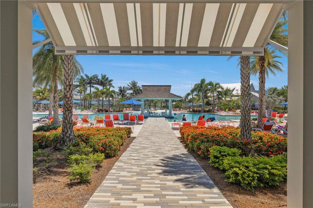 6359 Antigua Way Naples, FL 34113 - Photo 38 of 48 a view of swimming pool with an outdoor seating