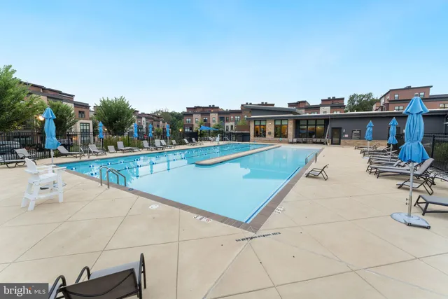 a view of a patio with swimming pool