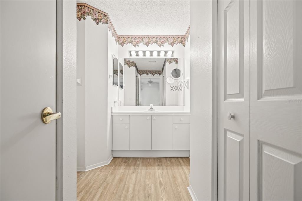 7343 Willowbrook Drive Spring Hill, FL 34606 - Photo 23 of 47 a view of a hallway with windows