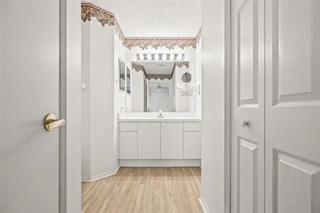 a view of a hallway with windows