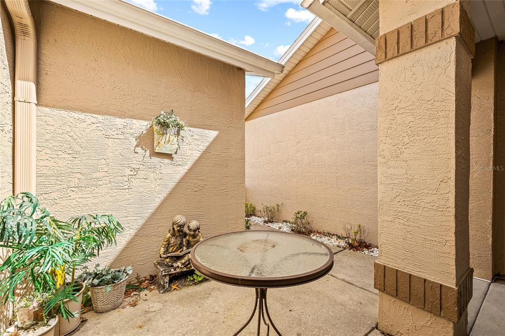 7343 Willowbrook Drive Spring Hill, FL 34606 - Photo 32 of 47 a bathroom with a sink and mirror
