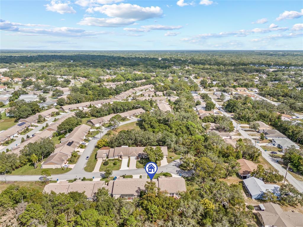 7343 Willowbrook Drive Spring Hill, FL 34606 - Photo 45 of 47 an aerial view of residential building with outdoor space