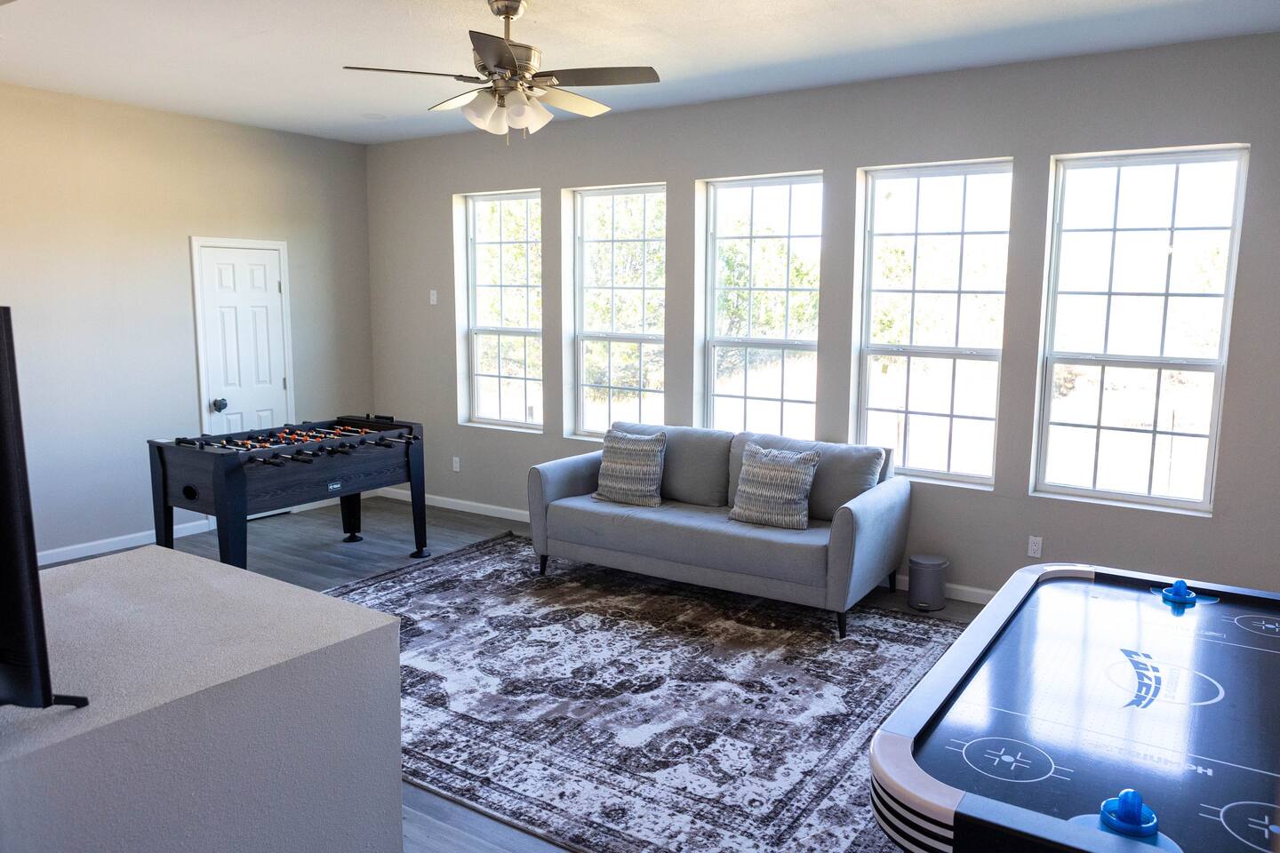 1901 Harmon Hills Road Dripping Springs, TX 78620 - Photo 19 of 27 Game room featuring wood finished floors and a ceiling fan