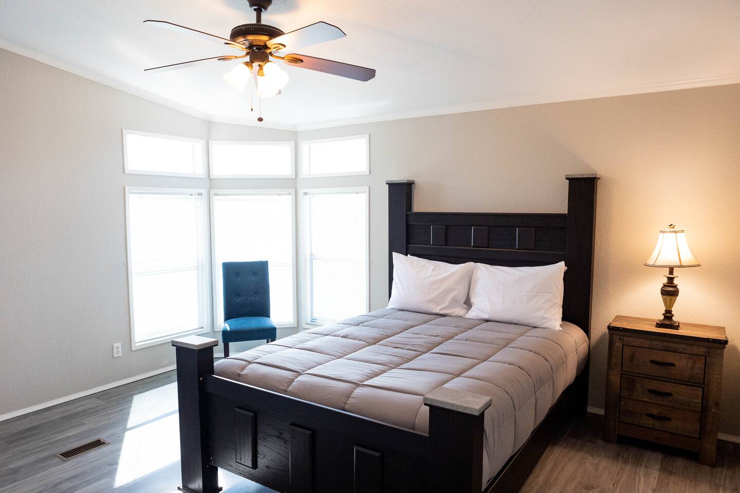 1901 Harmon Hills Road Dripping Springs, TX 78620 - Photo 26 of 27 Bedroom with dark wood-style flooring, ceiling fan, and crown molding