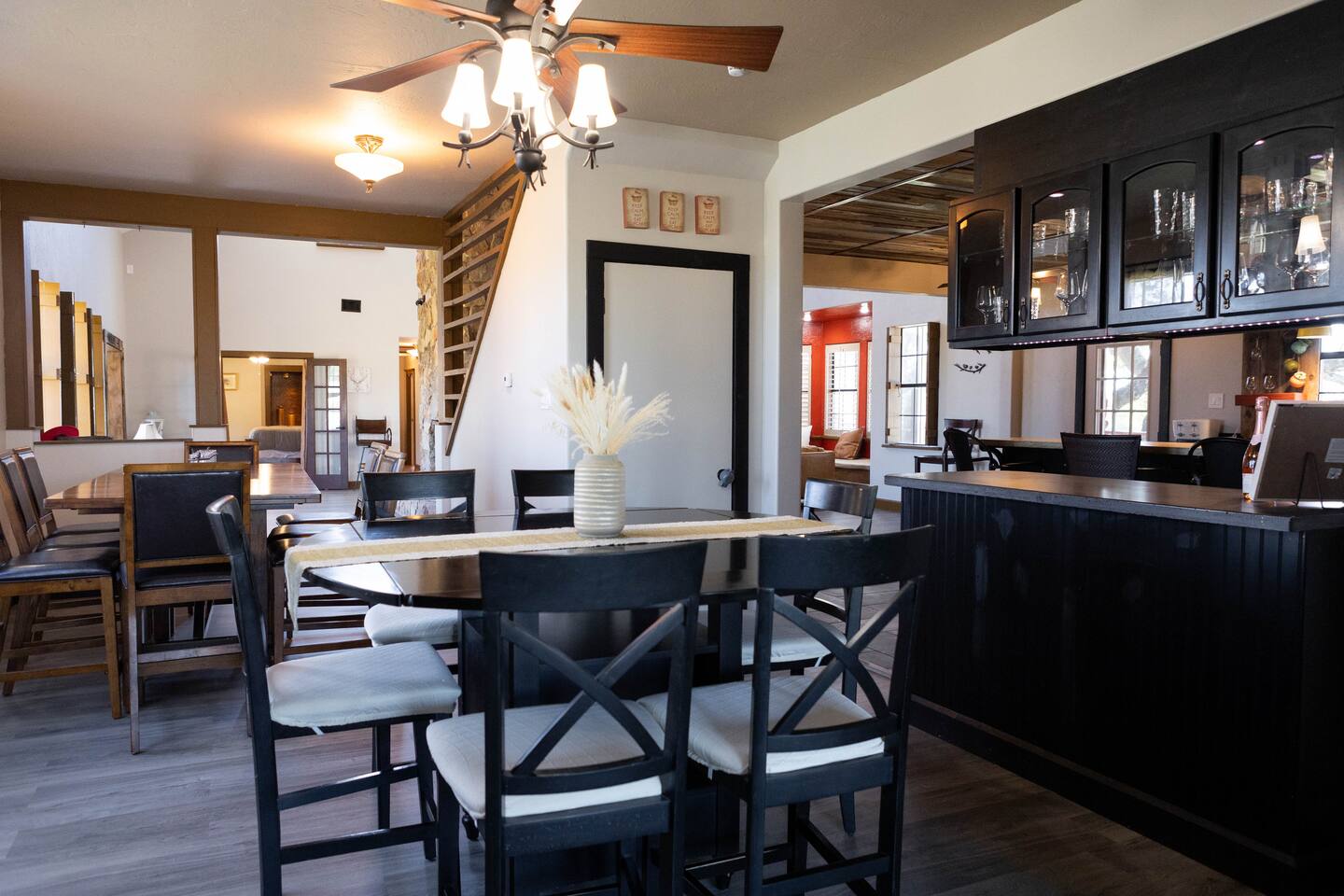 1901 Harmon Hills Road Dripping Springs, TX 78620 - Photo 5 of 27 Dining area with dark wood-type flooring and ceiling fan