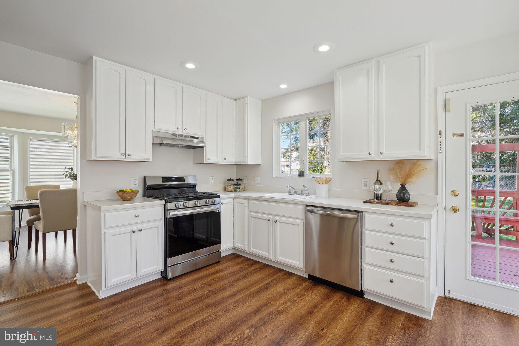 12406 Denley Road Silver Spring, MD 20906 - Photo 7 of 22 Kitchen with Stainless Steel Appliances
