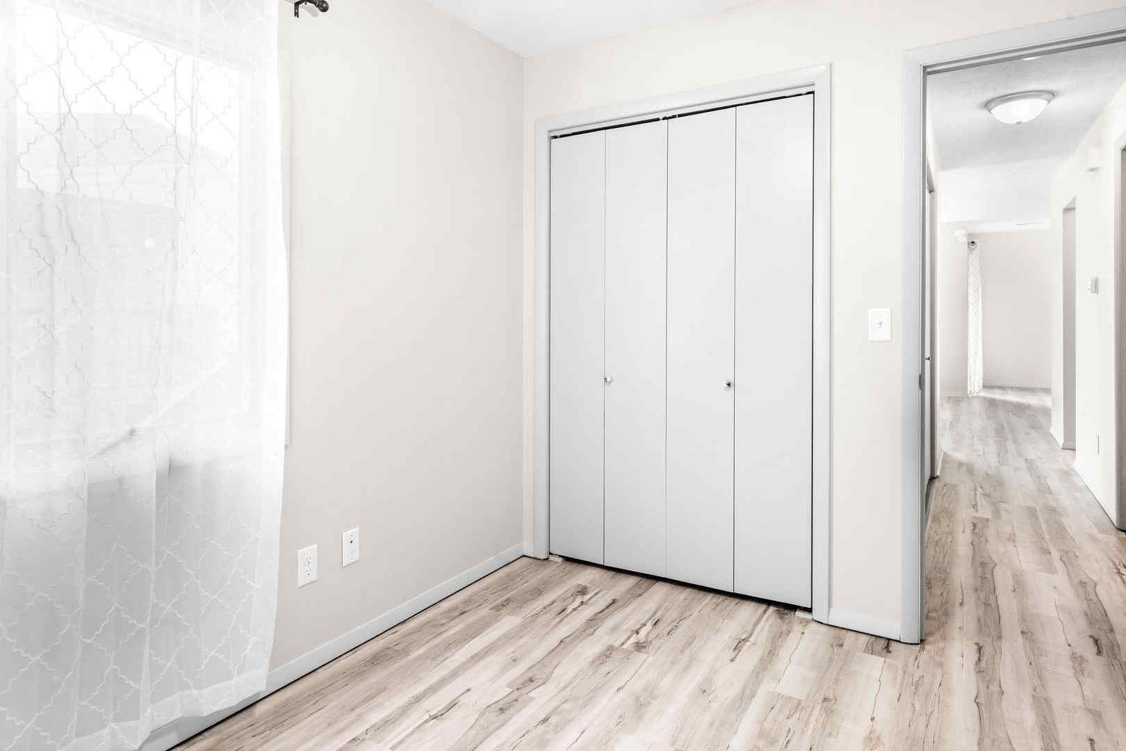 903 North Linden Street, Unit 17 Normal, IL 61761 - Photo 14 of 26 a view of a room with wooden floor