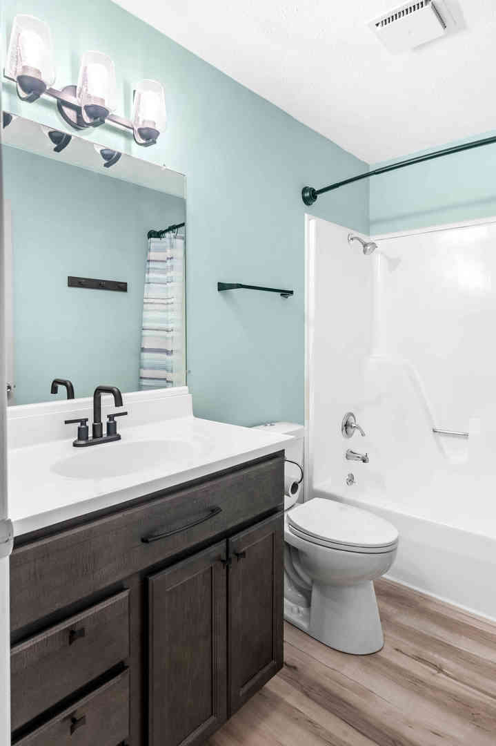 903 North Linden Street, Unit 17 Normal, IL 61761 - Photo 15 of 26 a bathroom with a sink and a mirror